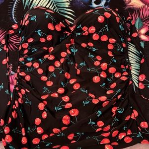 Cherry swimsuit one piece with skirt. No tag. Fits like a 2X.